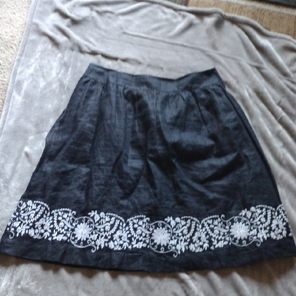 Black Knee-Length A-Line Skirt with Embellished Hem